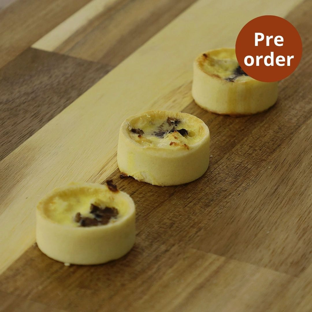 Mini quiche with brie and truffle, Maison Duffour, Dubai, UAE