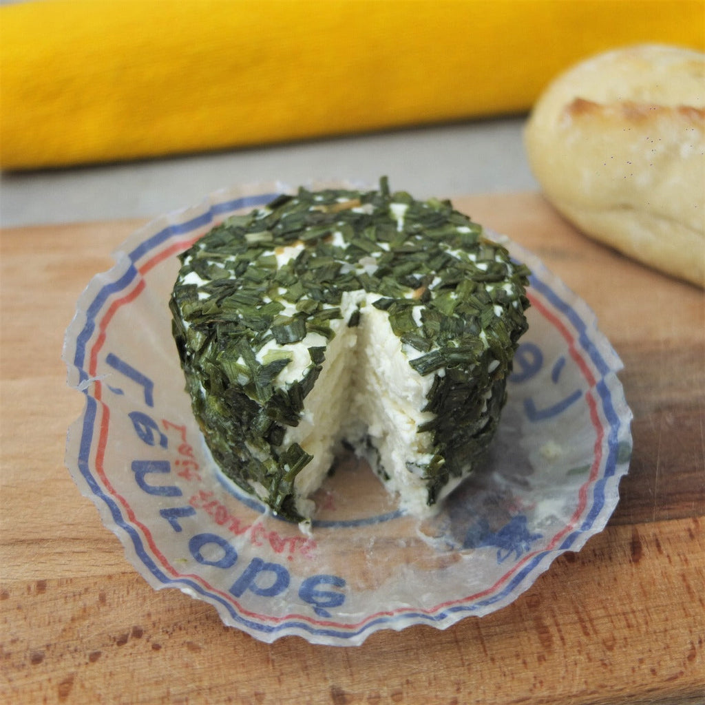 Fresh goat cheese coated with herbs and shallot, France | Maison Duffour