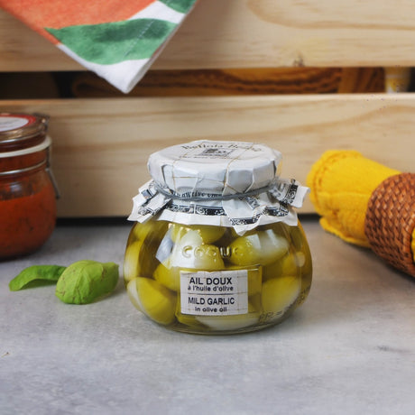 Mild garlic cloves in olive oil, Spain | Maison Duffour
